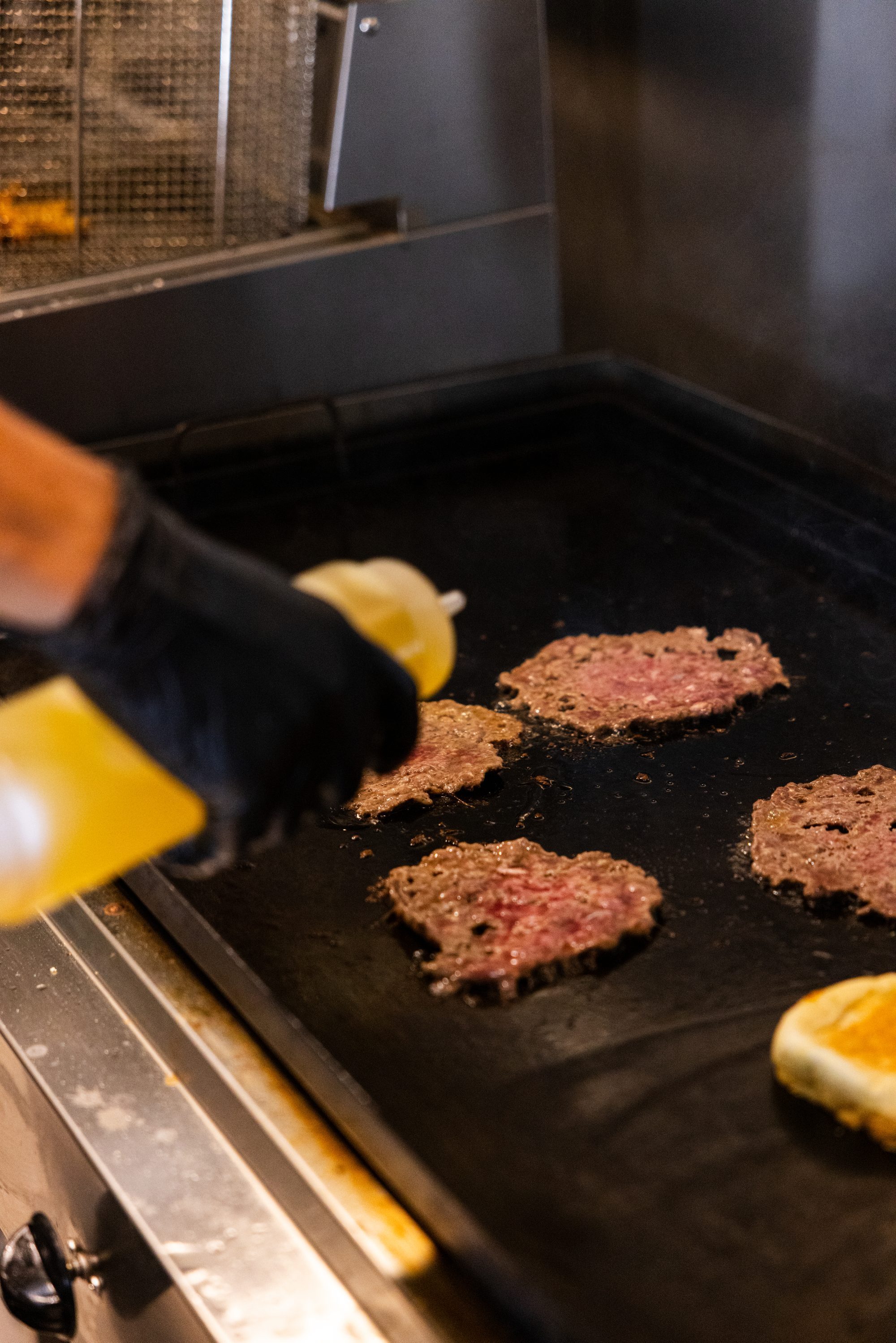 Beef patties on the griddle