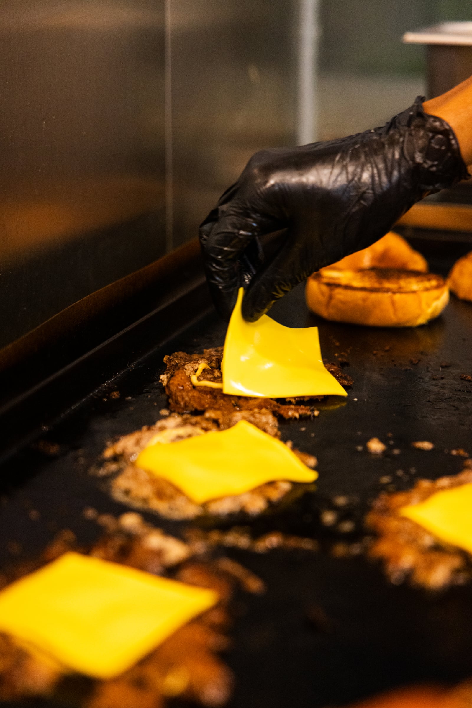 Placing cheese on the patty